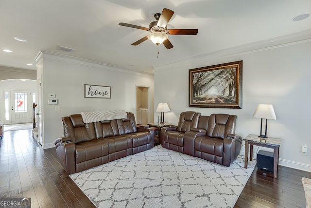 2225 Independence Ln, Buford, GA 30519 - living area with ceiling fan, crown molding, arched walkways, dark wood-style floors, and recessed lighting
