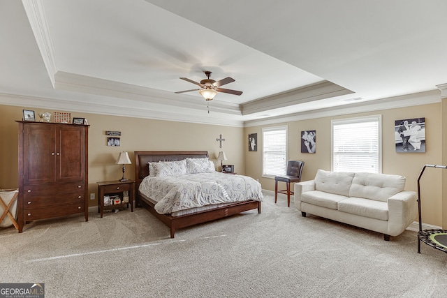 2225 Independence Ln, Buford, GA 30519 - bedroom featuring a tray ceiling, crown molding, light carpet, and ceiling fan