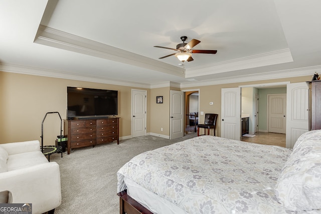 2225 Independence Ln, Buford, GA 30519 - bedroom featuring a tray ceiling, crown molding, light colored carpet, and a ceiling fan