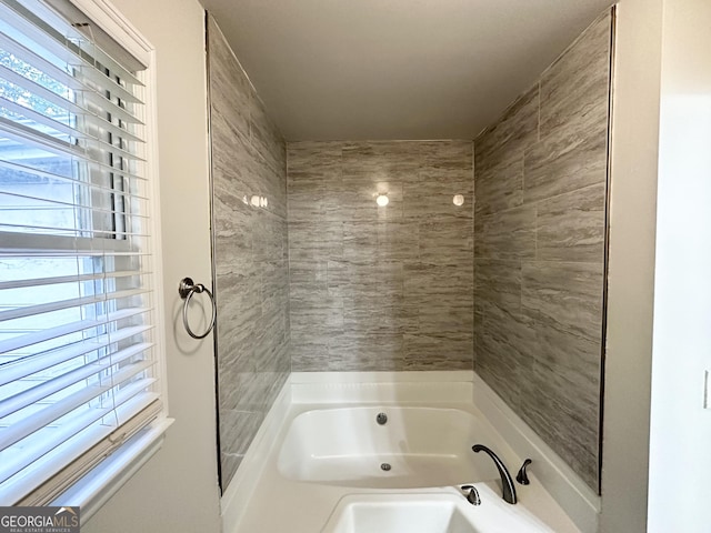 full bathroom featuring a tub