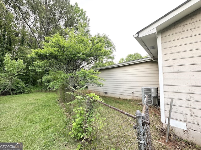 view of yard featuring central AC