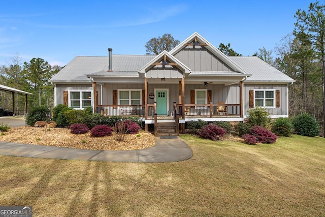 291 Higgins Rd, Flovilla, GA 30216 - craftsman inspired home with board and batten siding, a porch, and a front yard