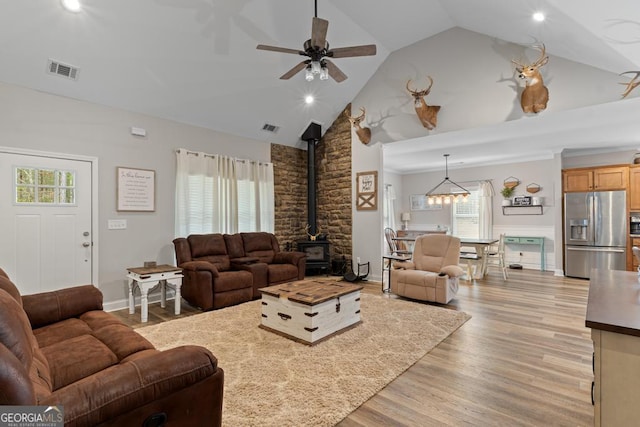 291 Higgins Rd, Flovilla, GA 30216 - living area featuring ceiling fan, a wood stove, recessed lighting, light wood-type flooring, and visible vents