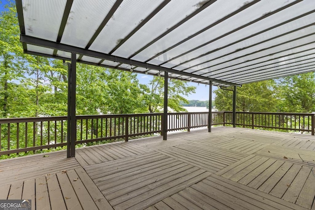 wooden terrace with a water view