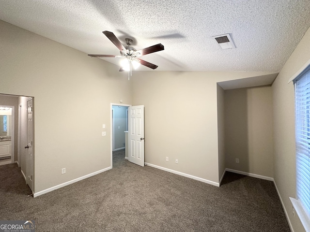263 Coral Cir, Mcdonough, GA 30253 - unfurnished bedroom with ceiling fan, a textured ceiling, visible vents, baseboards, and carpet flooring