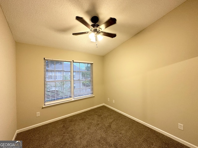 263 Coral Cir, Mcdonough, GA 30253 - spare room featuring dark colored carpet, a ceiling fan, a textured ceiling, and baseboards