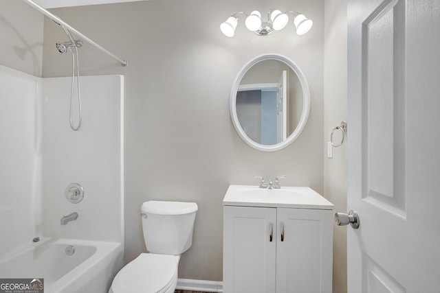 bathroom with toilet,  shower combination, and vanity
