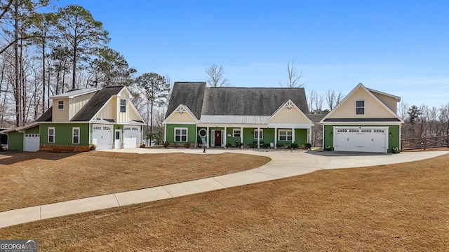 view of front of home with concrete driveway, board and batten siding, a shingled roof, covered porch, and a garage
