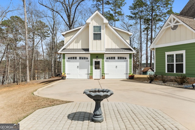 garage with concrete driveway