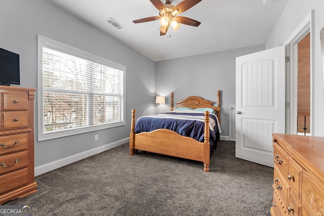 bedroom with carpet flooring, baseboards, and a ceiling fan