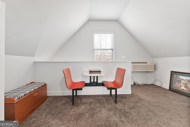 living area with carpet flooring, lofted ceiling, baseboards, and a wall mounted AC