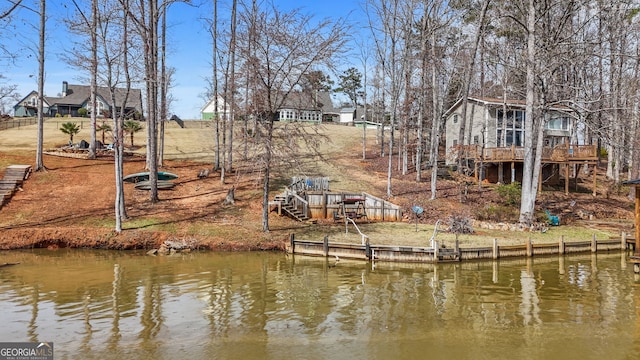 dock area with a deck with water view