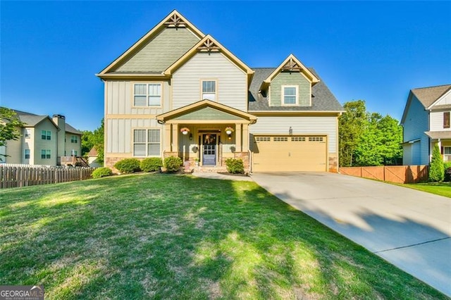 37 Wood Duck Pt, Jefferson, GA 30549 - craftsman house with board and batten siding, driveway, an attached garage, and stone siding