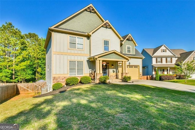 37 Wood Duck Pt, Jefferson, GA 30549 - craftsman-style home featuring board and batten siding, a garage, driveway, and stone siding