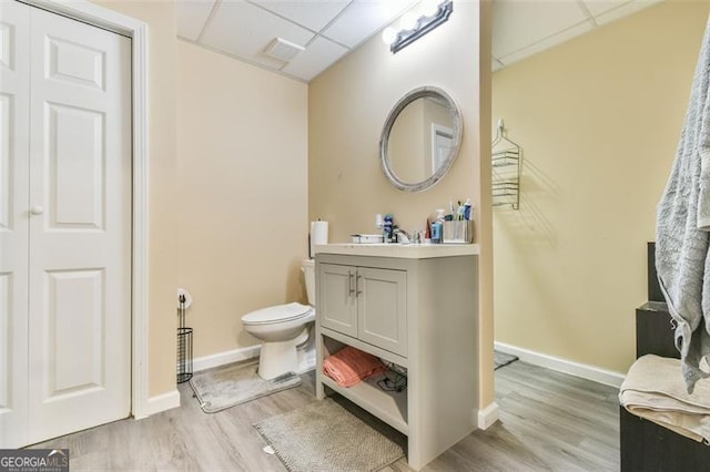 37 Wood Duck Pt, Jefferson, GA 30549 - bathroom featuring a drop ceiling, vanity, wood finished floors, and a closet