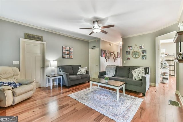 37 Wood Duck Pt, Jefferson, GA 30549 - living room featuring ceiling fan, light wood finished floors, and ornamental molding