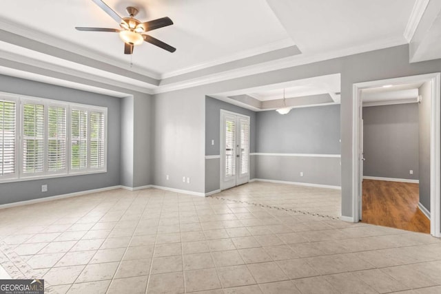 1502 River Green Dr NW Unit 1502, Atlanta, GA 30327 - spare room featuring french doors, a ceiling fan, a raised ceiling, ornamental molding, and light tile patterned flooring