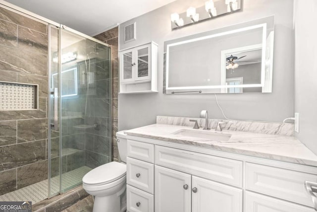 1502 River Green Dr NW Unit 1502, Atlanta, GA 30327 - full bath featuring a ceiling fan, visible vents, a shower stall, vanity, and toilet