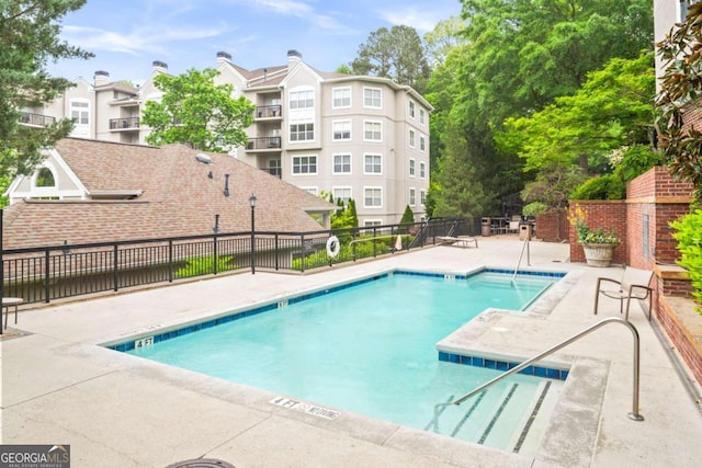 1502 River Green Dr NW Unit 1502, Atlanta, GA 30327 - pool featuring fence and a patio area