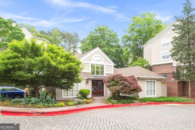 1502 River Green Dr NW Unit 1502, Atlanta, GA 30327 - view of front of property featuring french doors and stucco siding