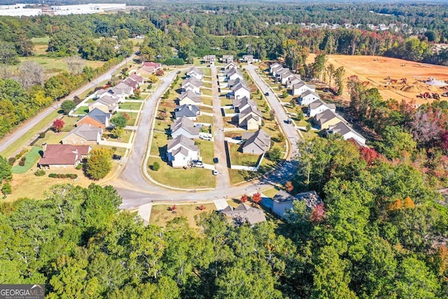 bird's eye view with a view of trees
