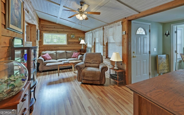 76 Periwinkle Ln, Cleveland, GA 30528 - living area with wood walls, a ceiling fan, wooden ceiling, light wood-type flooring, and vaulted ceiling