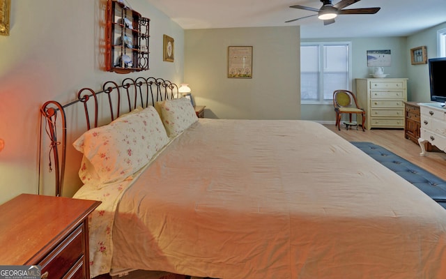 76 Periwinkle Ln, Cleveland, GA 30528 - bedroom featuring ceiling fan, wood finished floors, and multiple windows