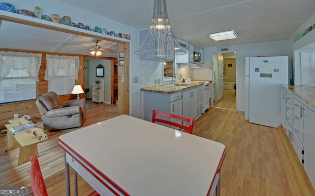 76 Periwinkle Ln, Cleveland, GA 30528 - dining room with ceiling fan and light wood-style flooring