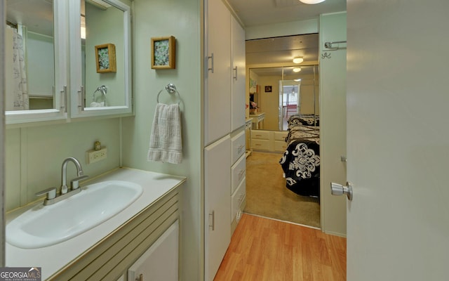 76 Periwinkle Ln, Cleveland, GA 30528 - bathroom featuring vanity and wood finished floors