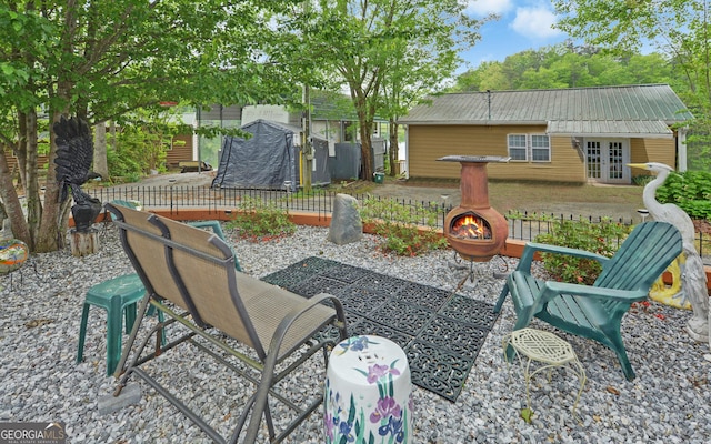 76 Periwinkle Ln, Cleveland, GA 30528 - exterior space with a patio, an outdoor fire pit, and french doors