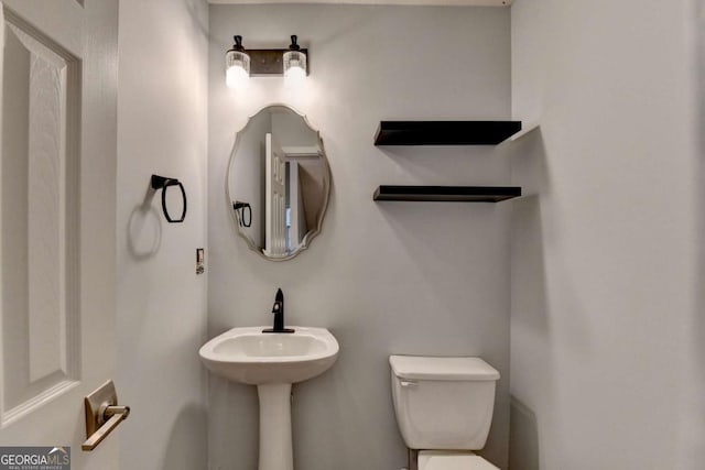 bathroom featuring toilet