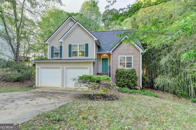 tri-level home featuring brick siding, driveway, and a garage