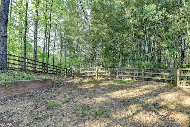 view of yard with fence