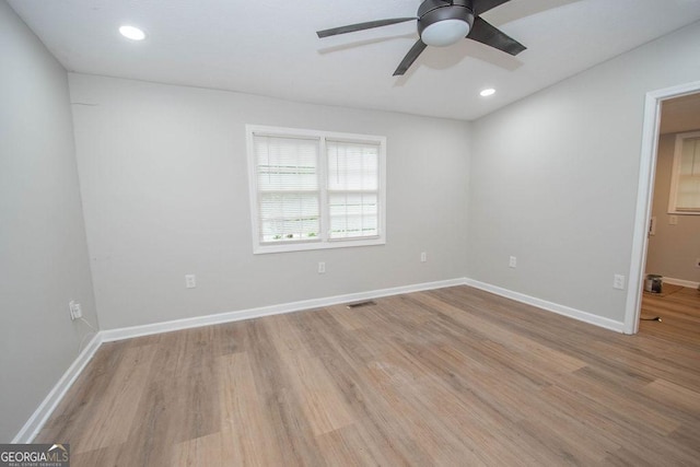 unfurnished room featuring a ceiling fan, visible vents, recessed lighting, and light wood-type flooring