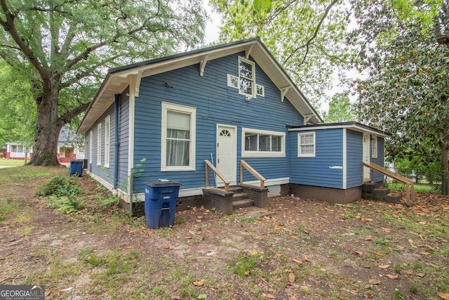 view of front of property with entry steps