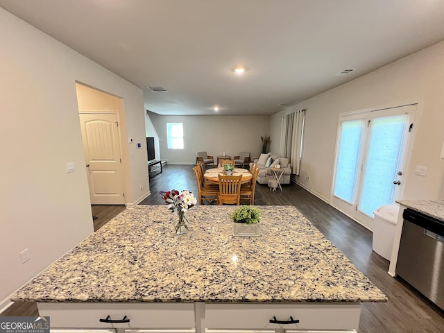 517 Starbuck Pkwy, Pendergrass, GA 30567 - kitchen featuring stainless steel dishwasher, light stone counters, dark wood-type flooring, open floor plan, and recessed lighting