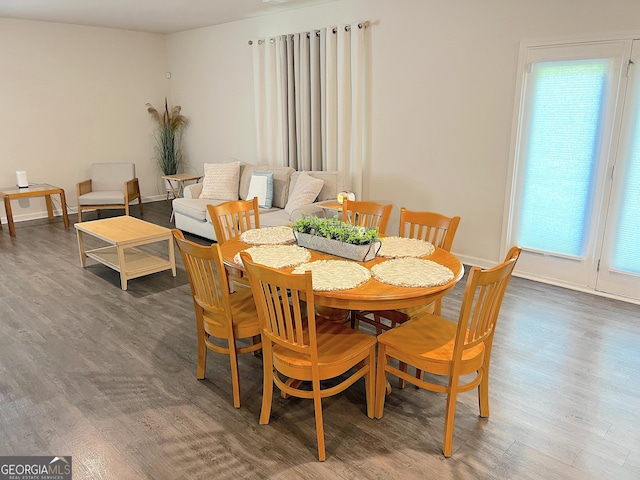 517 Starbuck Pkwy, Pendergrass, GA 30567 - dining space with wood finished floors and baseboards