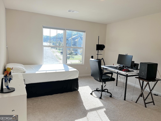 517 Starbuck Pkwy, Pendergrass, GA 30567 - bedroom with light colored carpet, an office area, and baseboards