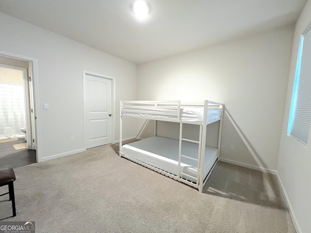 517 Starbuck Pkwy, Pendergrass, GA 30567 - unfurnished bedroom featuring carpet flooring and baseboards