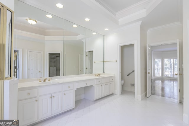 5685 Commons Ln, Alpharetta, GA 30005 - bathroom featuring a sink, ornamental molding, toilet, and double vanity