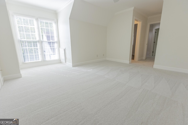 5685 Commons Ln, Alpharetta, GA 30005 - unfurnished living room with light colored carpet, baseboards, and crown molding