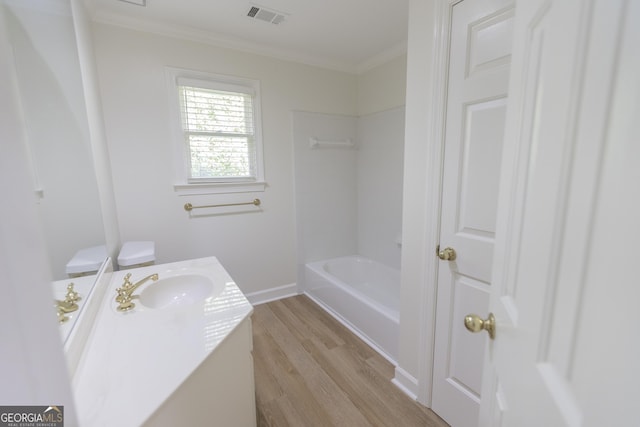 5685 Commons Ln, Alpharetta, GA 30005 - full bath featuring visible vents, wood finished floors, vanity, baseboards, and ornamental molding