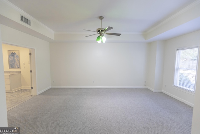 5685 Commons Ln, Alpharetta, GA 30005 - spare room with crown molding, carpet flooring, ceiling fan, baseboards, and visible vents