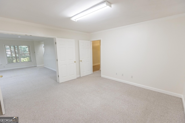 5685 Commons Ln, Alpharetta, GA 30005 - carpeted empty room featuring crown molding and baseboards
