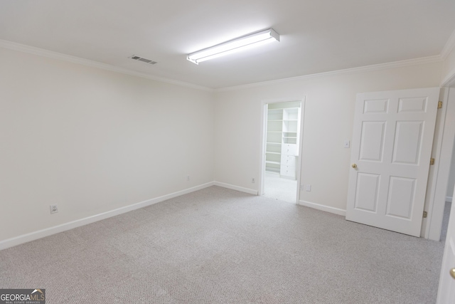 5685 Commons Ln, Alpharetta, GA 30005 - carpeted empty room with visible vents, ornamental molding, and baseboards