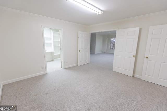 5685 Commons Ln, Alpharetta, GA 30005 - unfurnished room with crown molding, baseboards, and light carpet