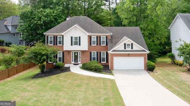 1812 Riverton Dr, Suwanee, GA 30024 - colonial house with brick siding, driveway, fence, and a front yard