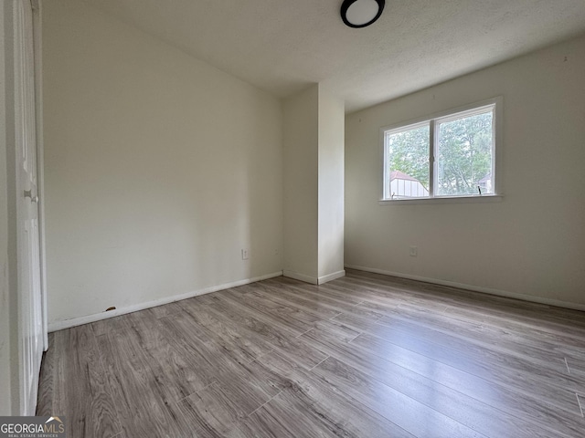 1812 Ashborough Cir SE Unit C, Marietta, GA 30067 - empty room with baseboards and wood finished floors