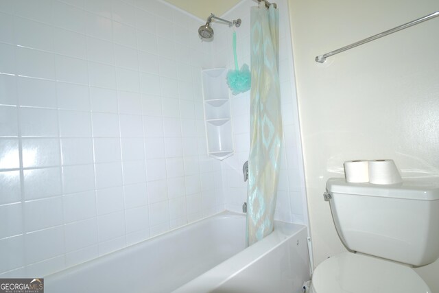 1812 Ashborough Cir SE Unit C, Marietta, GA 30067 - bathroom featuring shower / bath combo with shower curtain and toilet