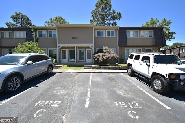 1812 Ashborough Cir SE Unit C, Marietta, GA 30067 - townhome / multi-family property with uncovered parking
